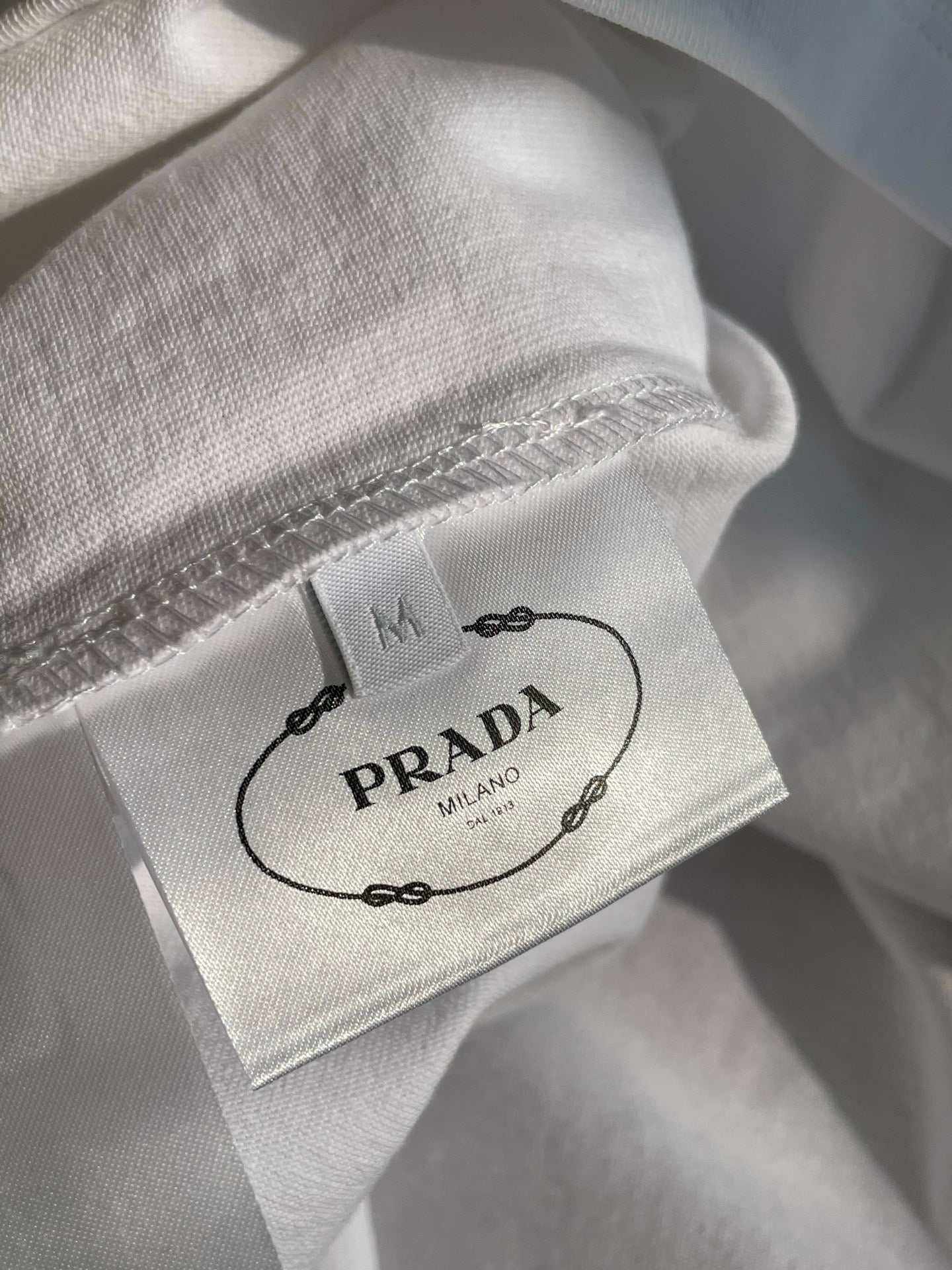 Prada Unisex Pocket Logo Long Sleeve T-Shirt in White, Size S/M/L/XL