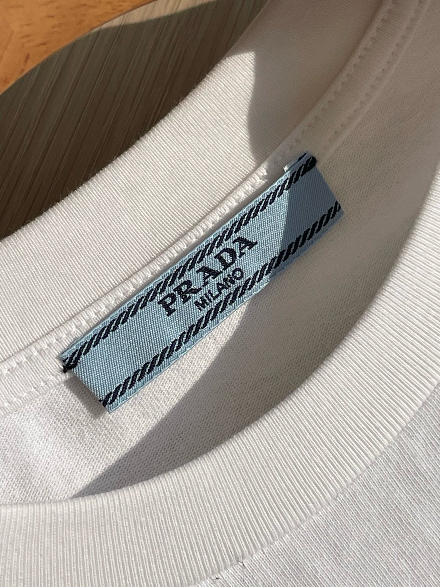 Prada Unisex Pocket Logo Long Sleeve T-Shirt in White, Size S/M/L/XL