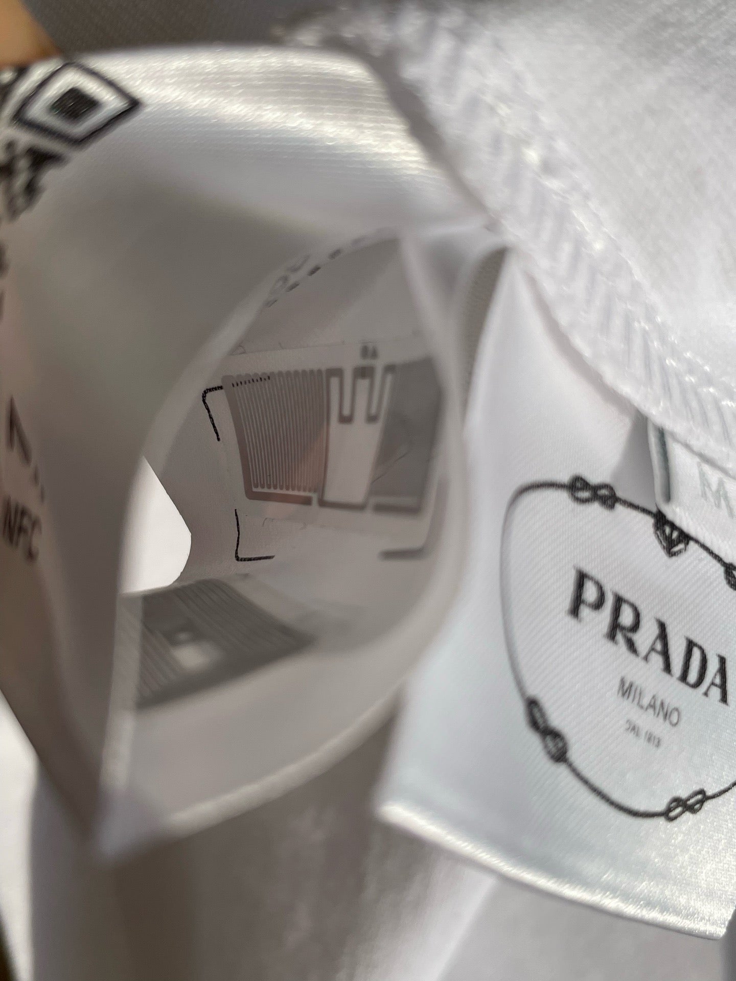 Prada Unisex Pocket Logo Long Sleeve T-Shirt in White, Size S/M/L/XL