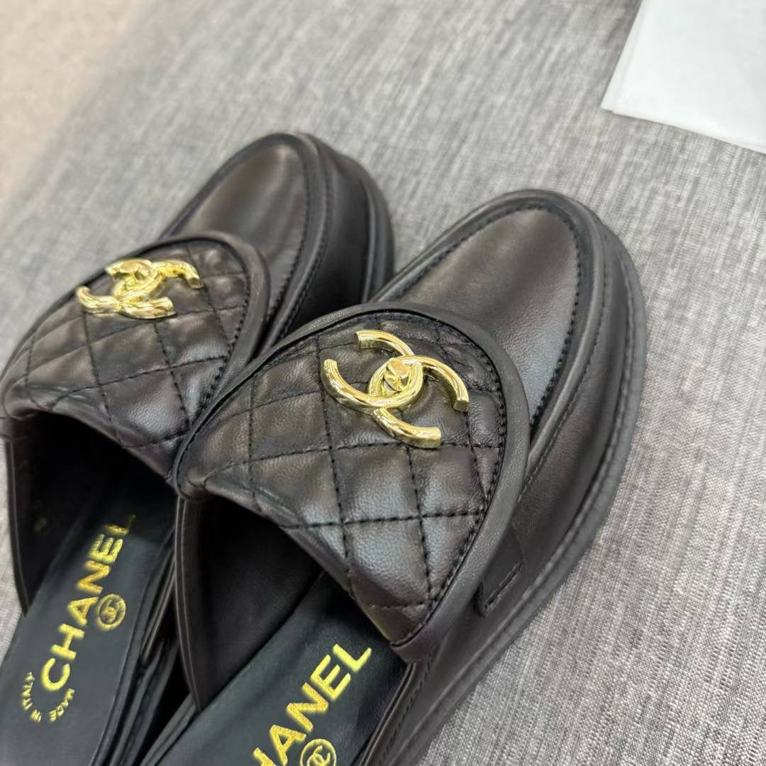 Chanel Gold CC Logo Mule in Black