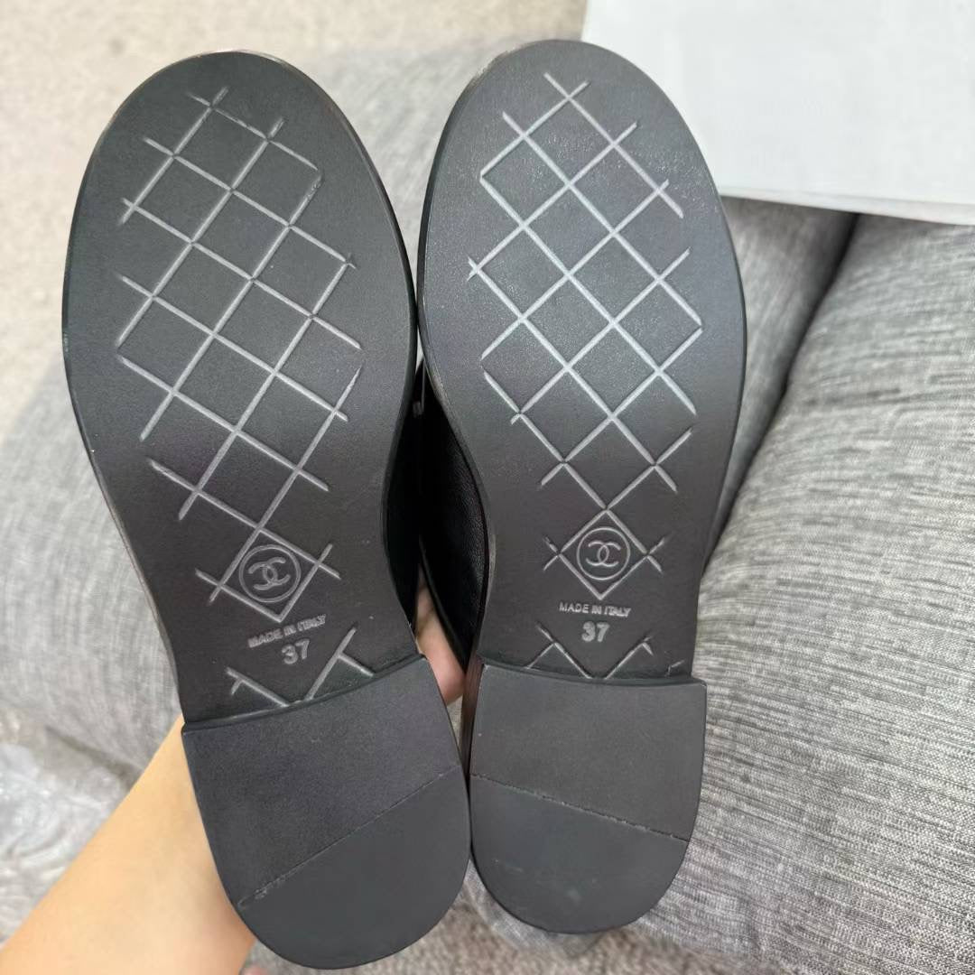 Chanel Gold CC Logo Mule in Black